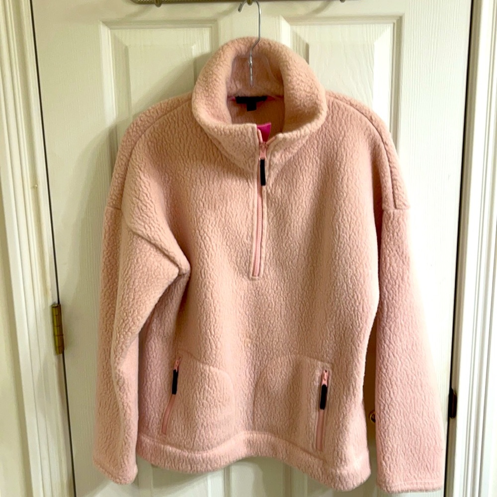 Women’s JCrew light pink fleece. Quarter zip with front zip slash pockets.